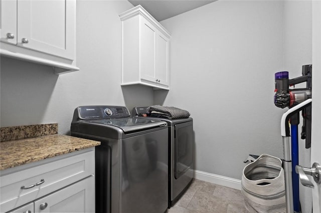 236 Ranalli Ave, Springdale, AR 72762 - washroom featuring cabinet space and washer and clothes dryer