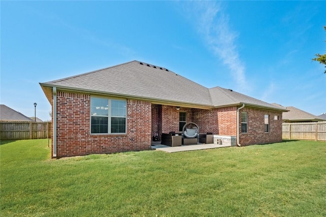 236 Ranalli Ave, Springdale, AR 72762 - rear view of house featuring brick siding, a patio, a fenced backyard, and roof with shingles