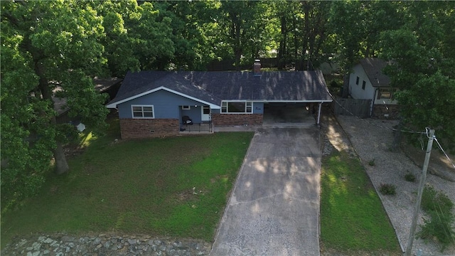 5 Chapel Ln, Bella Vista, AR 72715 - view of front of house featuring brick siding, concrete driveway, a carport, and a chimney