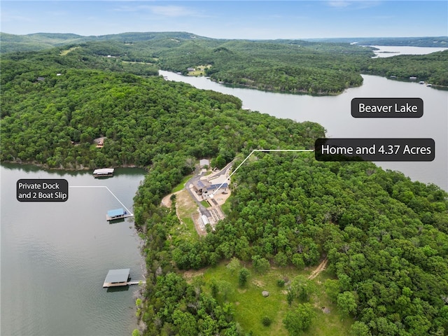 10393 Cedar Rock Rd, Garfield, AR 72732 - aerial view of property and surrounding area featuring a forest, a nearby body of water, and property parcel outlined