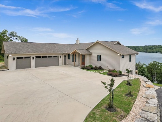 10393 Cedar Rock Rd, Garfield, AR 72732 - ranch-style house with an attached garage, driveway, a chimney, and a shingled roof