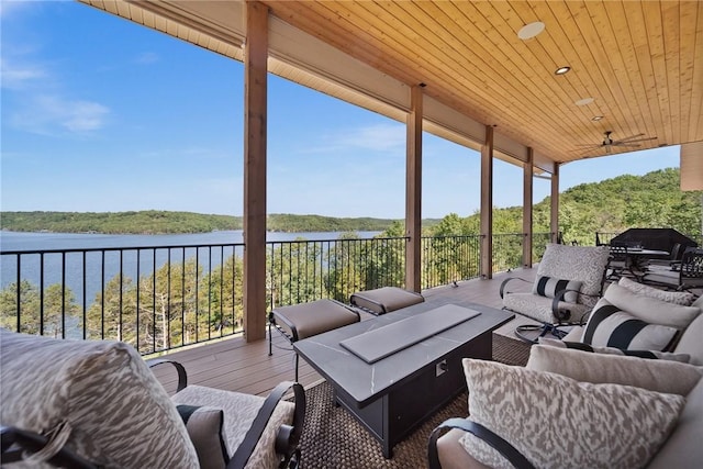 10393 Cedar Rock Rd, Garfield, AR 72732 - deck featuring an outdoor hangout area, a water view, area for grilling, and ceiling fan