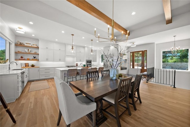 10393 Cedar Rock Rd, Garfield, AR 72732 - dining area featuring a chandelier, beam ceiling, light wood-style floors, and recessed lighting
