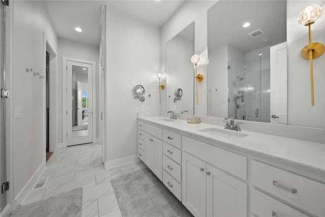 10393 Cedar Rock Rd, Garfield, AR 72732 - bathroom with baseboards, double vanity, a stall shower, marble look tiles, and recessed lighting