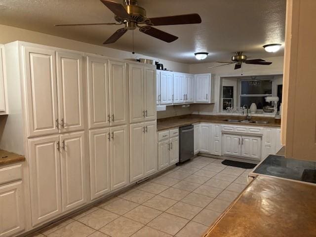 12883 Nickels Rd, West Fork, AR 72774 - kitchen with a sink, stainless steel dishwasher, ceiling fan, and light tile patterned flooring