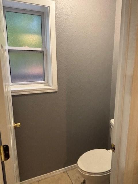 12883 Nickels Rd, West Fork, AR 72774 - bathroom featuring toilet and tile patterned flooring