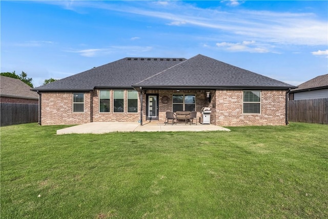 483 N Otoe St, Farmington, AR 72730 - rear view of house featuring brick siding, a patio area, and a shingled roof