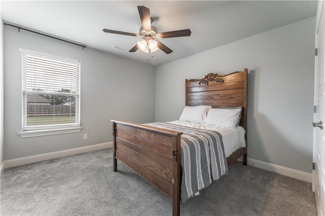 483 N Otoe St, Farmington, AR 72730 - carpeted bedroom with baseboards and a ceiling fan