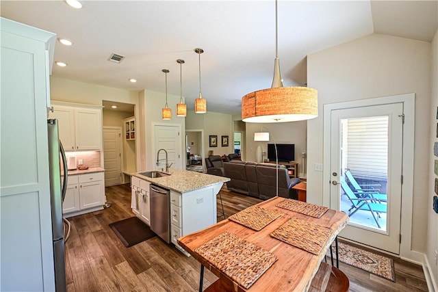 29 Bassingham Dr, Bella Vista, AR 72715 - kitchen featuring stainless steel appliances, a sink, dark wood-style flooring, white cabinetry, and recessed lighting