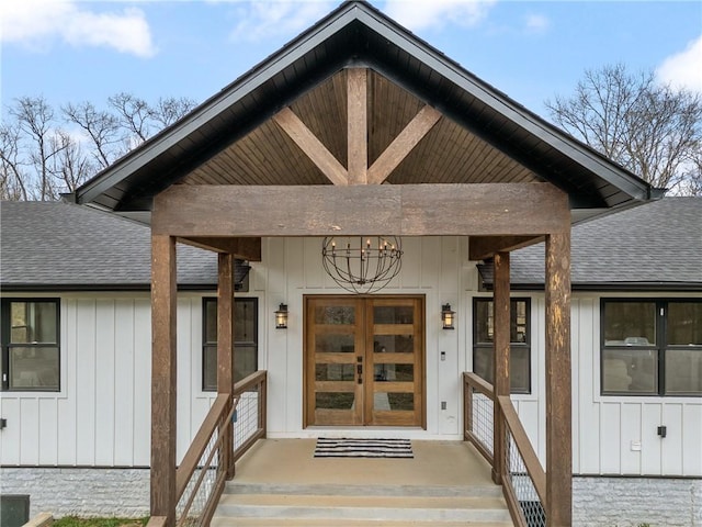 12698 Bush Rd, Centerton, AR 72719 - property entrance with a shingled roof and board and batten siding