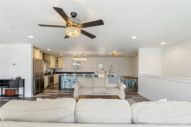 12698 Bush Rd, Centerton, AR 72719 - living room featuring french doors, dark wood-style floors, recessed lighting, ceiling fan, and baseboards