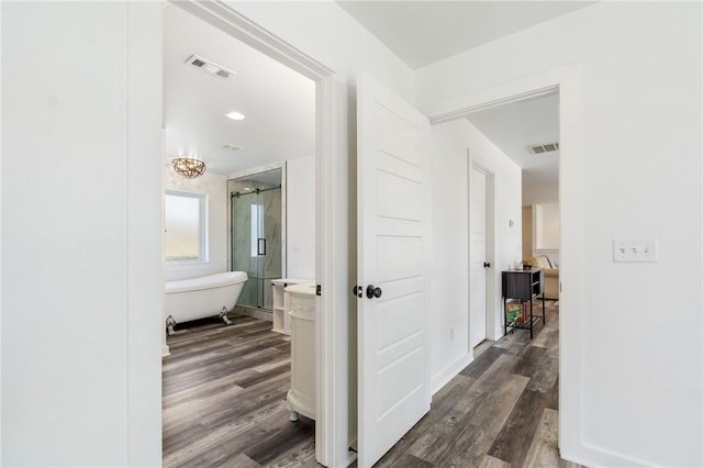 12698 Bush Rd, Centerton, AR 72719 - hall featuring dark wood-type flooring