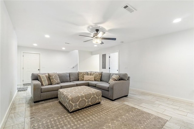 12698 Bush Rd, Centerton, AR 72719 - living area with ceiling fan, recessed lighting, baseboards, and electric panel