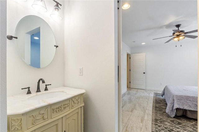 12698 Bush Rd, Centerton, AR 72719 - bathroom with vanity, ceiling fan, and recessed lighting