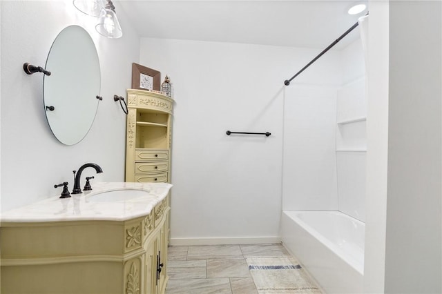 12698 Bush Rd, Centerton, AR 72719 - bathroom featuring washtub / shower combination, vanity, marble finish floors, and baseboards