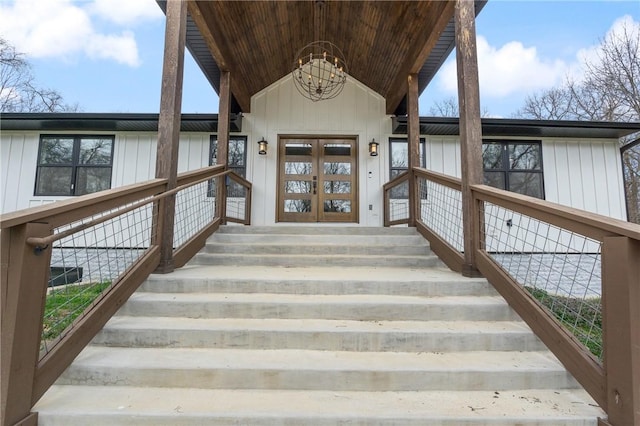 12698 Bush Rd, Centerton, AR 72719 - doorway to property with board and batten siding