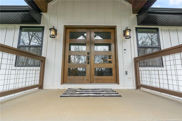 12698 Bush Rd, Centerton, AR 72719 - view of exterior entry featuring board and batten siding