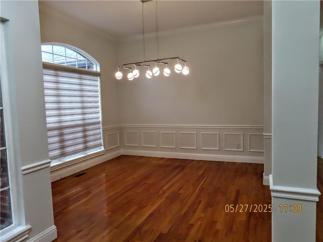 4007 Georgia St, Springdale, AR 72762 - unfurnished dining area featuring wood finished floors and crown molding