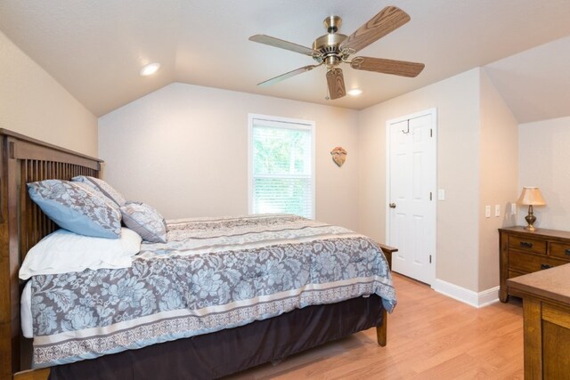 15210 Haynes Rd, Rogers, AR 72756 - bedroom with light wood-style floors, baseboards, ceiling fan, lofted ceiling, and recessed lighting