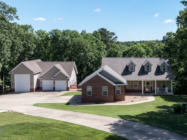 15210 Haynes Rd, Rogers, AR 72756 - view of front of house featuring a porch, brick siding, a front lawn, and driveway