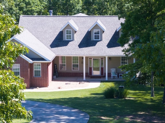 15210 Haynes Rd, Rogers, AR 72756 - cape cod-style house with a front lawn, a porch, and roof with shingles