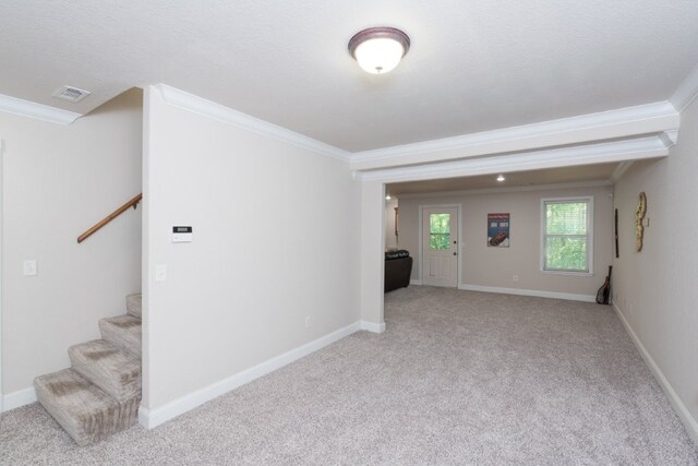 15210 Haynes Rd, Rogers, AR 72756 - unfurnished room featuring crown molding, light colored carpet, stairs, and baseboards