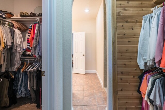 15210 Haynes Rd, Rogers, AR 72756 - spacious closet with tile patterned floors and arched walkways