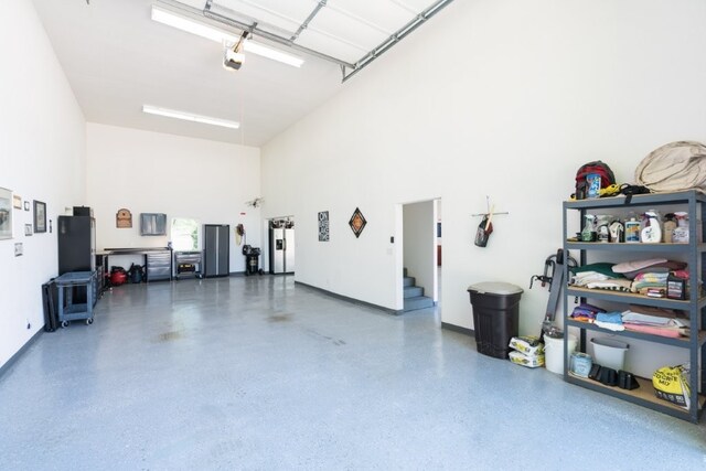 15210 Haynes Rd, Rogers, AR 72756 - garage featuring a garage door opener