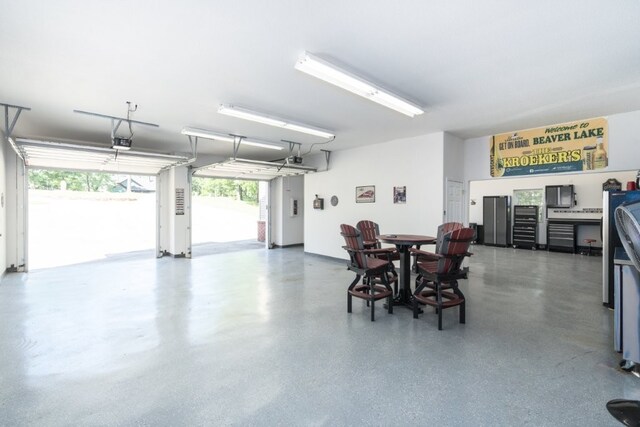 15210 Haynes Rd, Rogers, AR 72756 - garage featuring a garage door opener