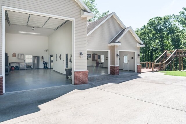 15210 Haynes Rd, Rogers, AR 72756 - garage featuring driveway