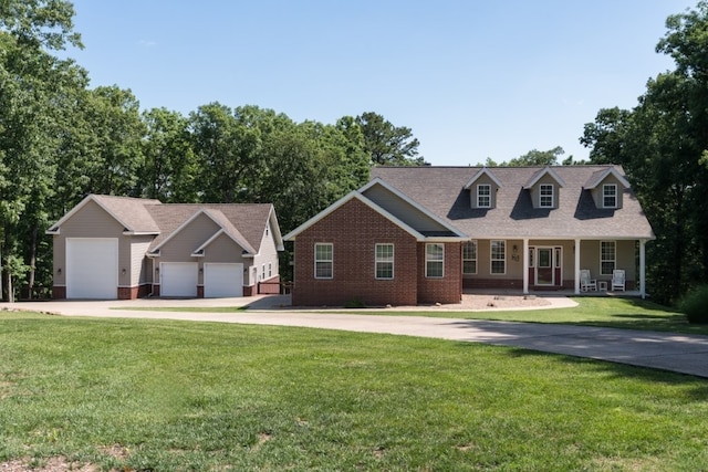 15210 Haynes Rd, Rogers, AR 72756 - view of front of home with brick siding, a front yard, driveway, and covered porch