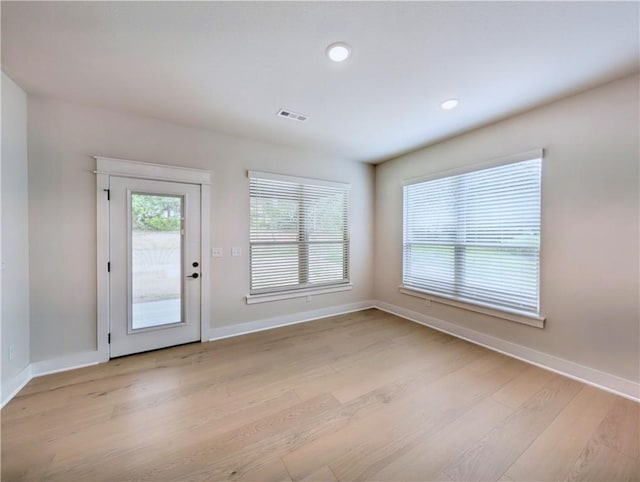1 Darten Cir, Bella Vista, AR 72714 - spare room featuring light wood finished floors, baseboards, and recessed lighting