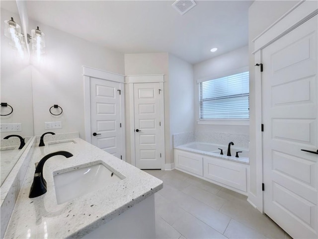 1 Darten Cir, Bella Vista, AR 72714 - bathroom with double vanity, a garden tub, tile patterned flooring, and recessed lighting