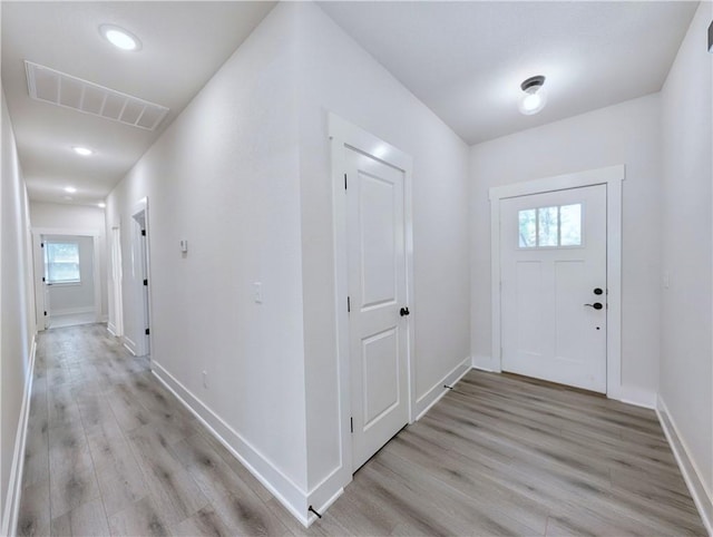 13 Epping Dr, Bella Vista, AR 72714 - foyer entrance featuring light wood-style floors, baseboards, and recessed lighting