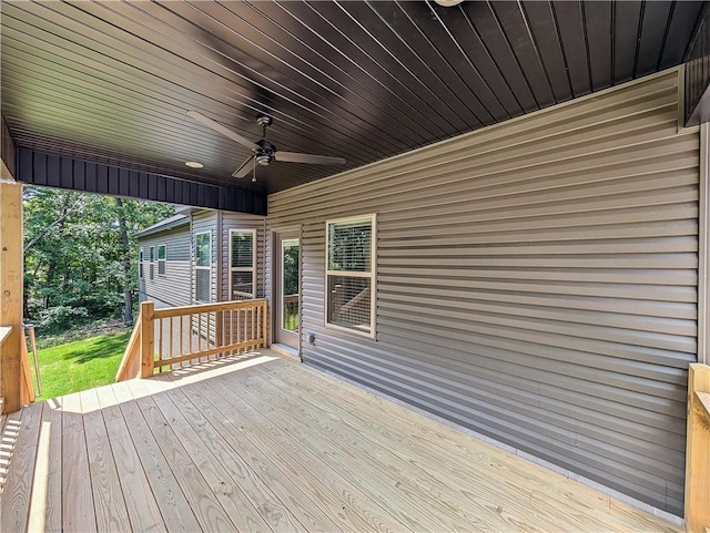 13 Epping Dr, Bella Vista, AR 72714 - deck featuring a ceiling fan