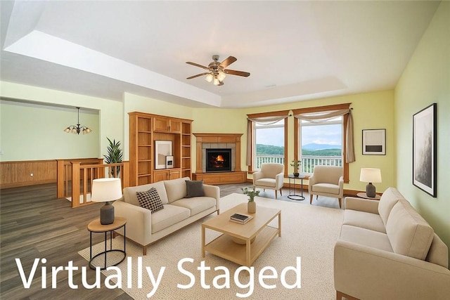 17 La Costa Dr, Holiday Island, AR 72631 - living area with a raised ceiling, wood finished floors, and ceiling fan