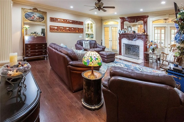 1060 Marina Way, Russellville, AR 72801 - living room with french doors, a ceiling fan, dark wood-type flooring, crown molding, and a fireplace with flush hearth