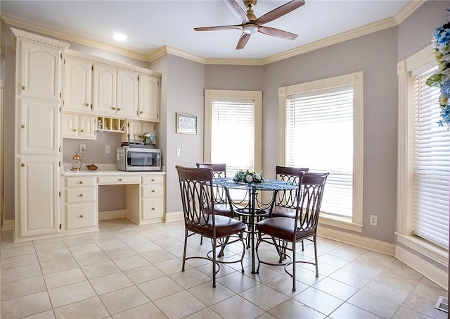 1060 Marina Way, Russellville, AR 72801 - dining space featuring baseboards, light tile patterned floors, ceiling fan, plenty of natural light, and ornamental molding