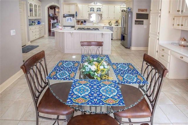 1060 Marina Way, Russellville, AR 72801 - dining space with baseboards and light tile patterned flooring