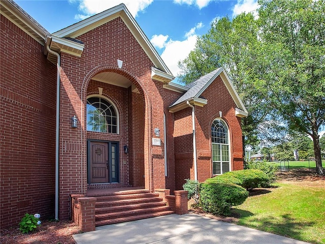 1060 Marina Way, Russellville, AR 72801 - property entrance with brick siding and a yard