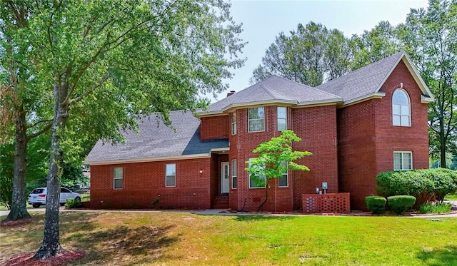 1060 Marina Way, Russellville, AR 72801 - view of front of house featuring brick siding, a front yard, and roof with shingles