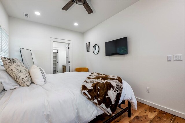 327 S E Ave, Fayetteville, AR 72701 - bedroom featuring wood finished floors, a ceiling fan, and recessed lighting