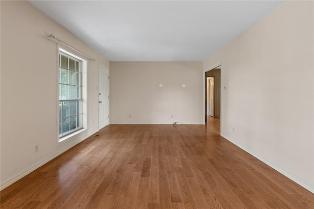 5 Rolling Meadows Dr, Harrison, AR 72601 - empty room with wood finished floors and baseboards