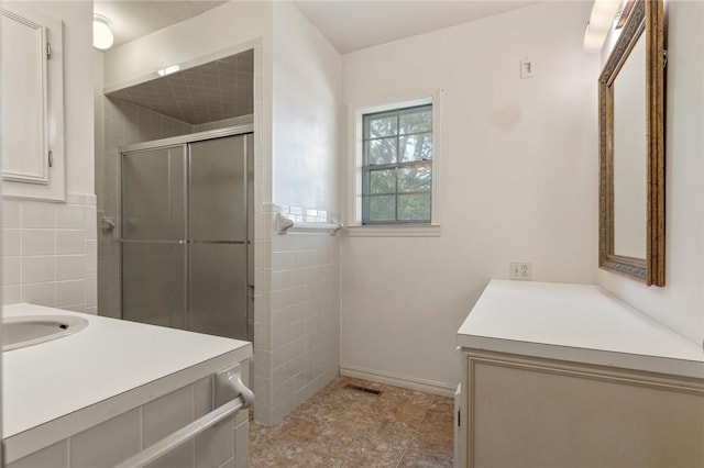 5 Rolling Meadows Dr, Harrison, AR 72601 - full bath with vanity, a stall shower, and tile walls
