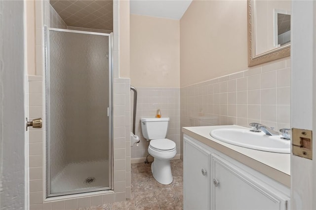 5 Rolling Meadows Dr, Harrison, AR 72601 - bathroom with toilet, a stall shower, tile walls, vanity, and tile patterned floors