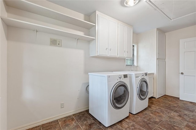 5 Rolling Meadows Dr, Harrison, AR 72601 - washroom with attic access, washing machine and dryer, baseboards, cabinet space, and stone finish floors