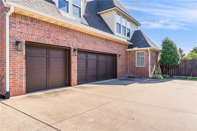 2314 S The Peaks Blvd, Rogers, AR 72758 - garage featuring concrete driveway