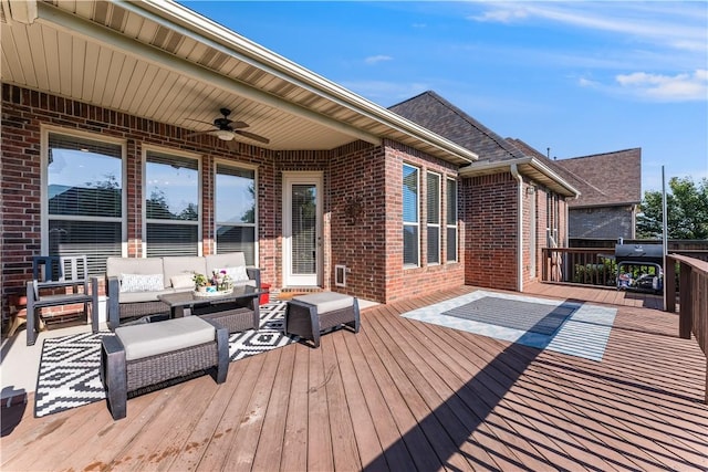 2314 S The Peaks Blvd, Rogers, AR 72758 - deck featuring a ceiling fan and an outdoor living space