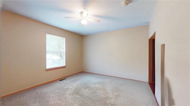 15829 N Wimpy Jones Rd, Garfield, AR 72732 - carpeted empty room featuring ceiling fan, baseboards, and a smoke detector