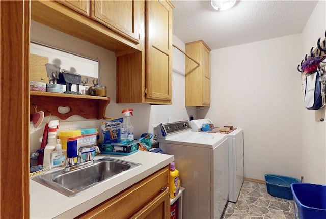 15829 N Wimpy Jones Rd, Garfield, AR 72732 - laundry room with washing machine and clothes dryer, cabinet space, and a textured ceiling